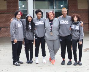 The student body sends off the wrestling State qualifiers.